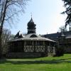 Ośmiokątna dawna ujeżdżalnia dla koni, dziś basen i sauna dla gości, Darek