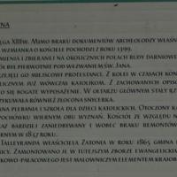 Zatonie - tablica przy ruinach kościoła, Artur